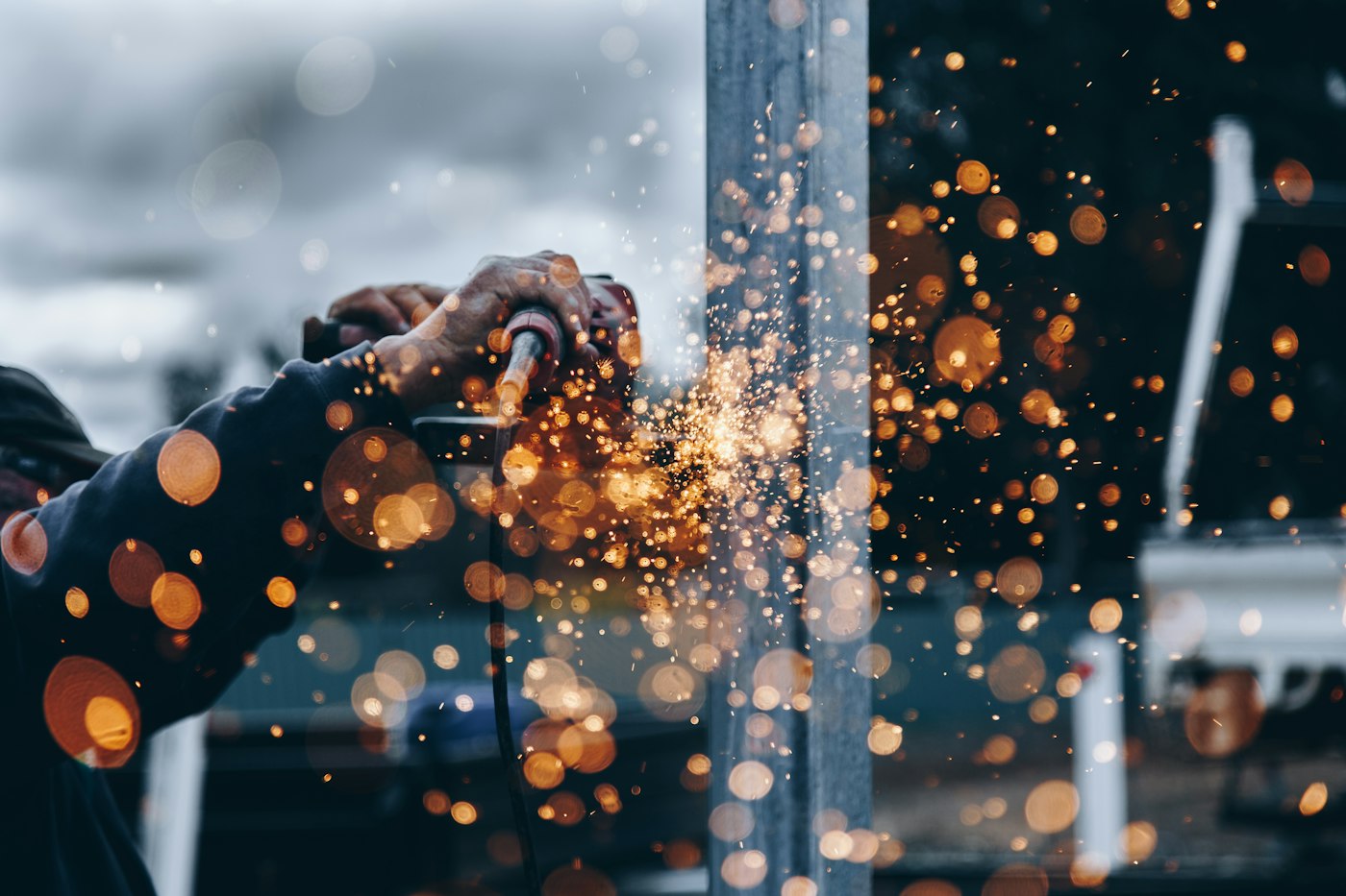 Welder fabricating steel structural beams